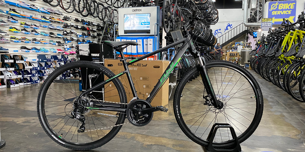 fuji e-bike fully 2021 Fuji Traverse 1.7 Disc Shimano Tourney 7 Speed